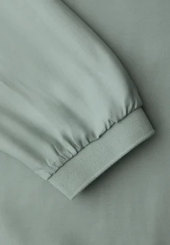Bluse mit Elastiksaum