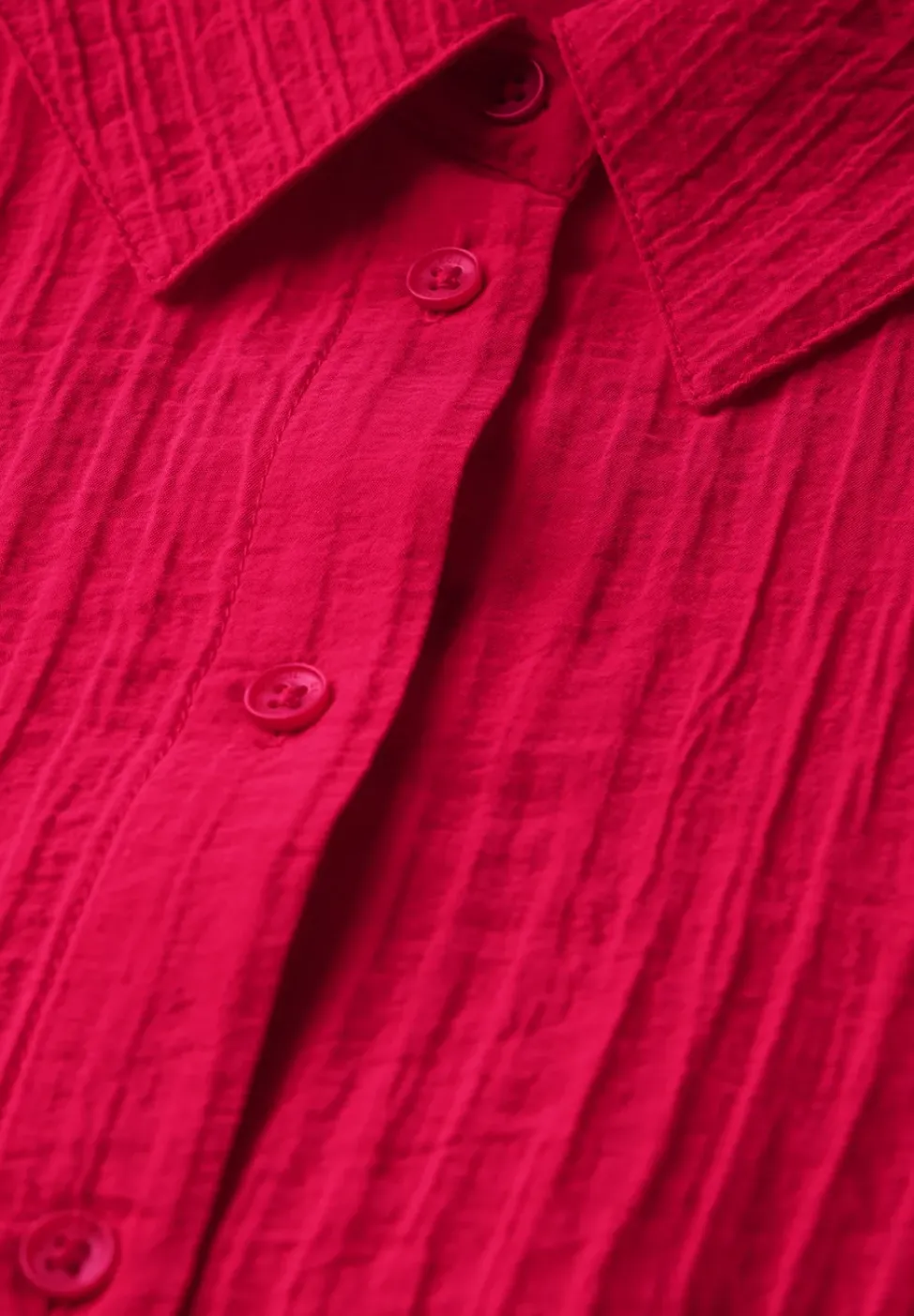 Kurze Strukturbluse